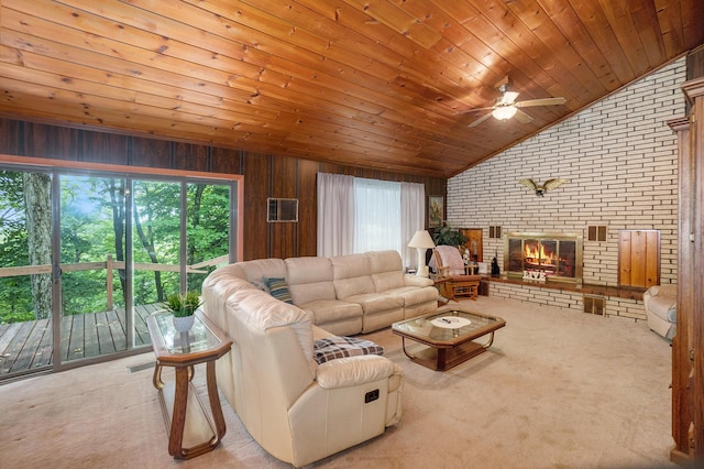 4424 Teal Ln, Newaygo, MI 49337 - living room with brick wall, plenty of natural light, ceiling fan, carpet flooring, and lofted ceiling
