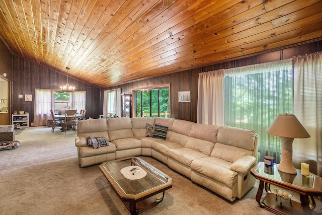 4424 Teal Ln, Newaygo, MI 49337 - carpeted living room featuring wood walls, healthy amount of natural light, vaulted ceiling, a chandelier, and wooden ceiling
