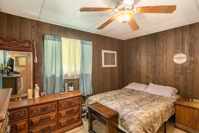 4424 Teal Ln, Newaygo, MI 49337 - bedroom featuring wooden walls and a ceiling fan