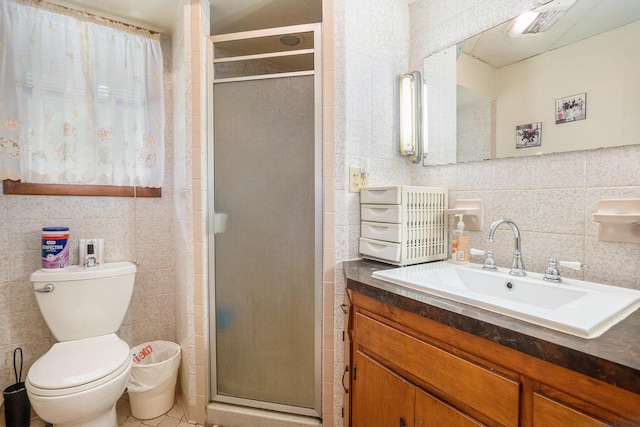4424 Teal Ln, Newaygo, MI 49337 - bathroom with tile walls, vanity, a shower stall, and tile patterned flooring