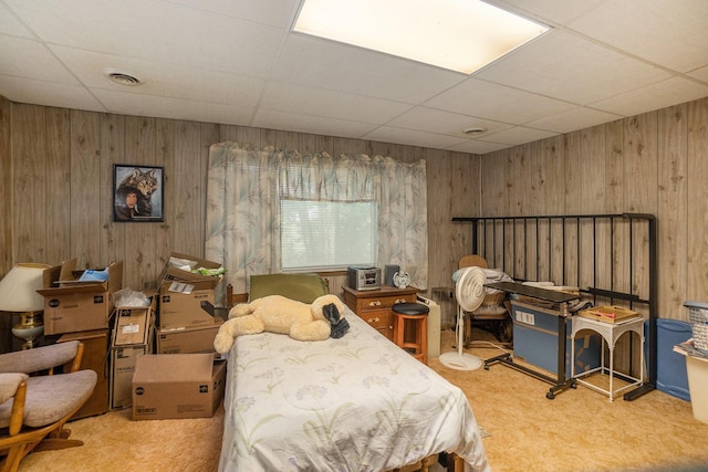 4424 Teal Ln, Newaygo, MI 49337 - bedroom with a drop ceiling, carpet floors, and wooden walls
