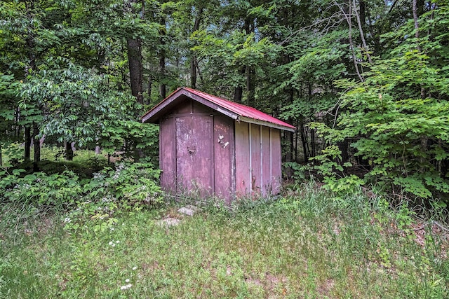 4424 Teal Ln, Newaygo, MI 49337 - view of shed with a wooded view