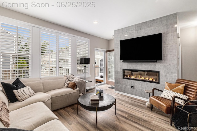 475 Jenny Way, Brighton, MI 48116 - living area with wood finished floors, a fireplace, and recessed lighting