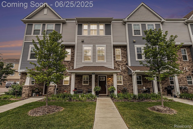 475 Jenny Way, Brighton, MI 48116 - multi unit property featuring a yard and brick siding