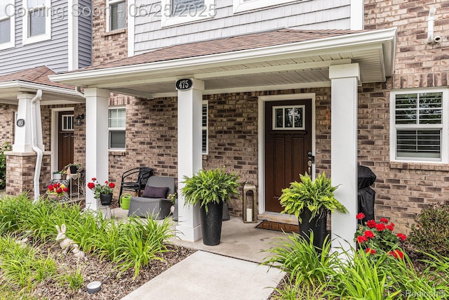 475 Jenny Way, Brighton, MI 48116 - property entrance featuring a porch