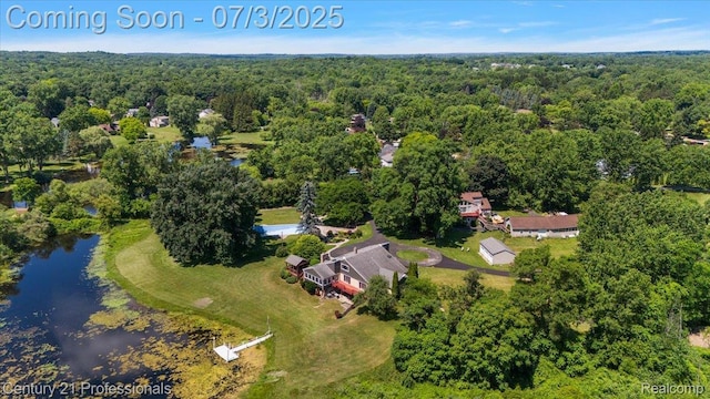 291 N Baldwin Rd, Clarkston, MI 48348 - aerial overview of property's location with a heavily wooded area and a large body of water