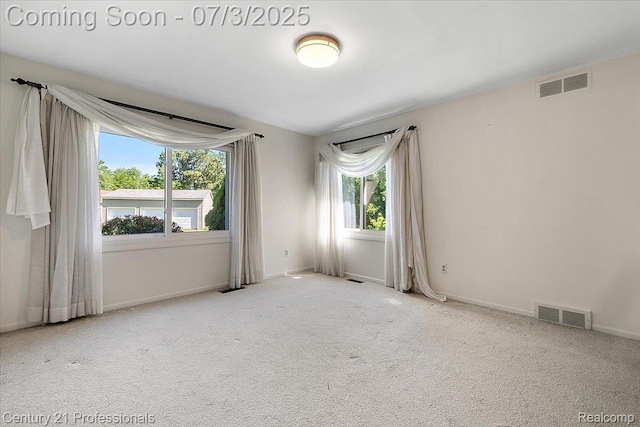 291 N Baldwin Rd, Clarkston, MI 48348 - carpeted spare room with plenty of natural light