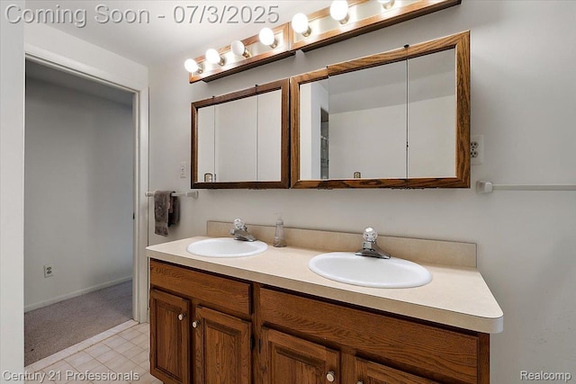 291 N Baldwin Rd, Clarkston, MI 48348 - bathroom featuring double vanity and baseboards