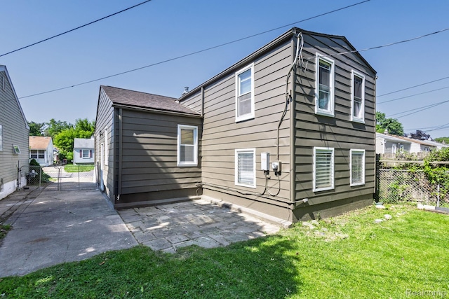 1730 E Hazelhurst St, Ferndale, MI 48220 - back of house with a patio area