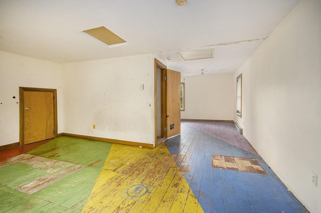 9563 Oak Rd, Willis, MI 48191 - spare room featuring hardwood / wood-style flooring and a smoke detector