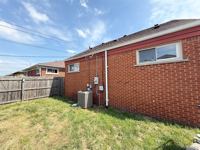 8121 Marian St, Warren, MI 48093 - view of home's exterior featuring brick siding