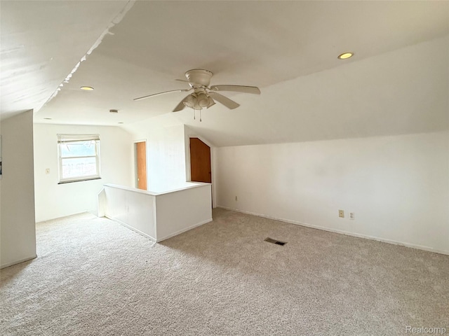 8121 Marian St, Warren, MI 48093 - additional living space with vaulted ceiling, ceiling fan, light colored carpet, and recessed lighting