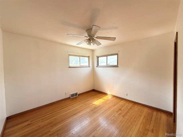 8121 Marian St, Warren, MI 48093 - spare room featuring light wood-style floors and a ceiling fan