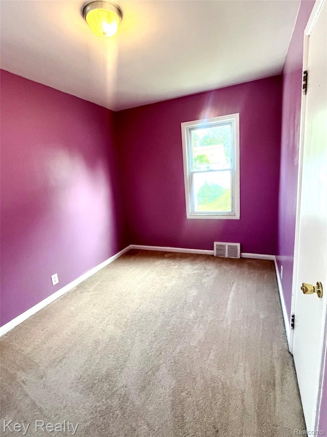 13509 Backus St, Southgate, MI 48195 - spare room with carpet flooring