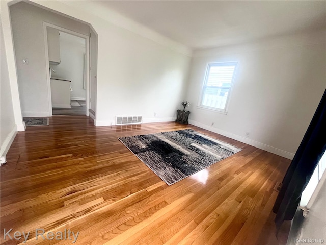13509 Backus St, Southgate, MI 48195 - spare room with wood finished floors and baseboards