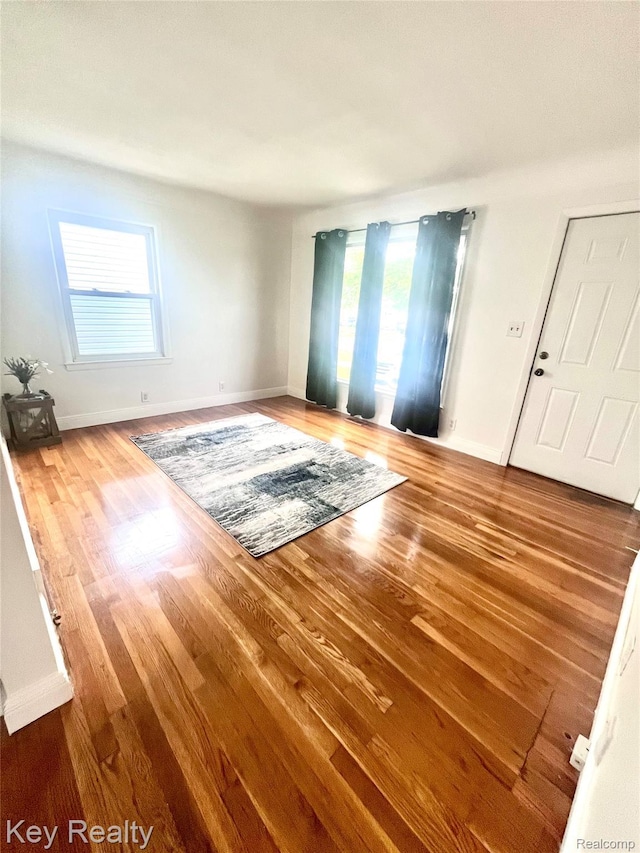 13509 Backus St, Southgate, MI 48195 - unfurnished room featuring wood finished floors and healthy amount of natural light
