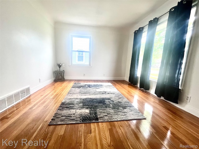 13509 Backus St, Southgate, MI 48195 - empty room featuring wood finished floors