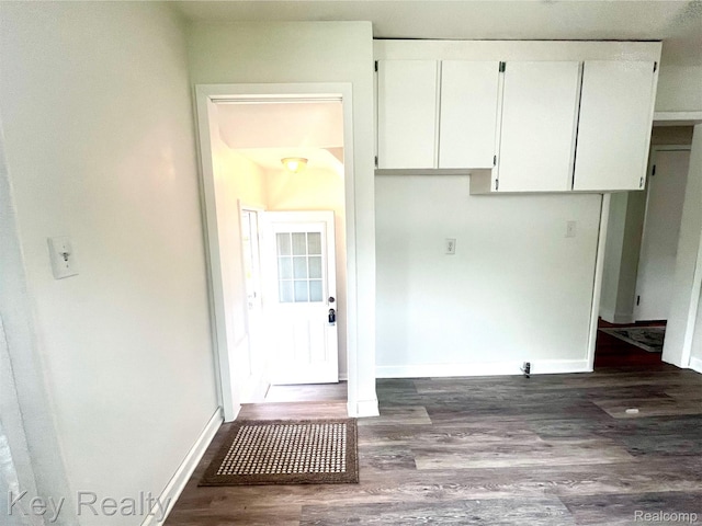 13509 Backus St, Southgate, MI 48195 - kitchen with white cabinetry and dark wood-style flooring