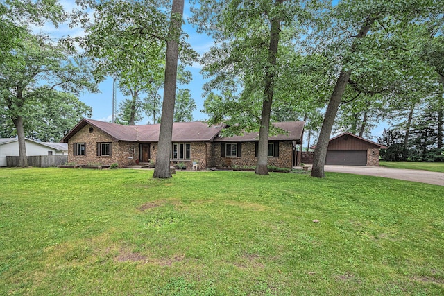 33370 Frantz Dr, Niles, MI 49120 - view of front of home featuring a garage and brick siding