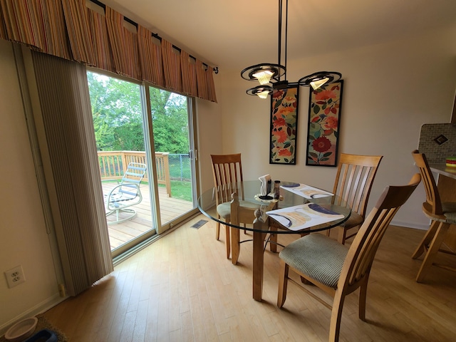 3393 Kevin Cir, Warren, MI 48092 - dining area with light wood-type flooring