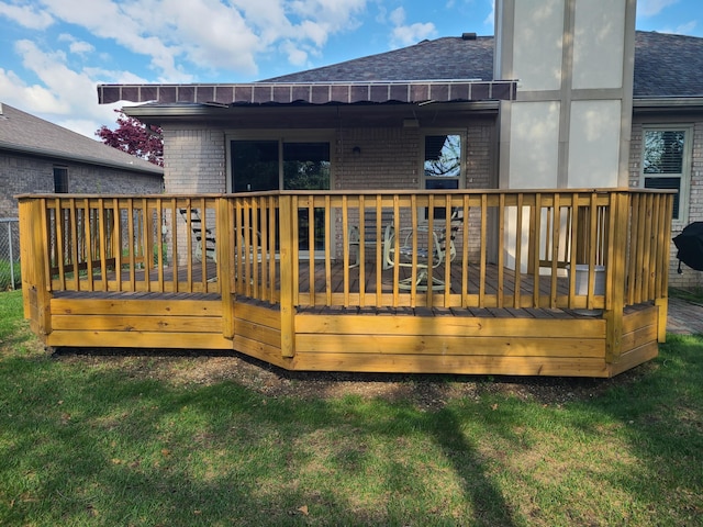 3393 Kevin Cir, Warren, MI 48092 - rear view of house with a shingled roof, brick siding, a lawn, and a wooden deck