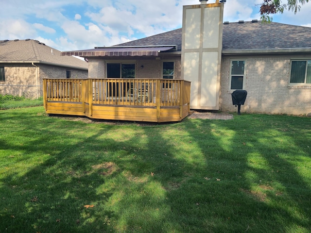 3393 Kevin Cir, Warren, MI 48092 - back of property featuring brick siding, a deck, a shingled roof, and a chimney