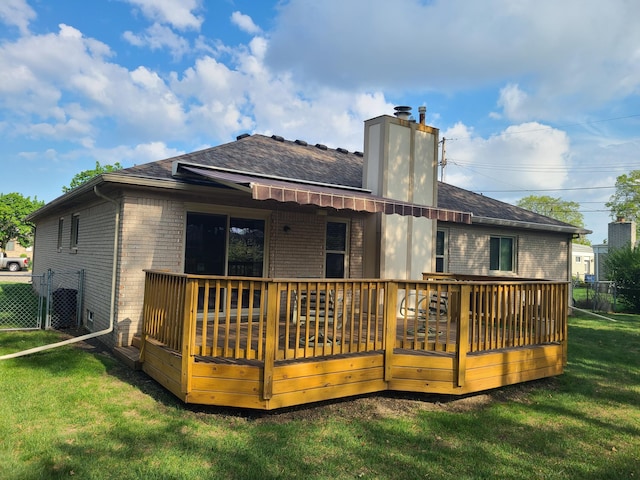 3393 Kevin Cir, Warren, MI 48092 - rear view of house with brick siding, a deck, a chimney, and roof with shingles