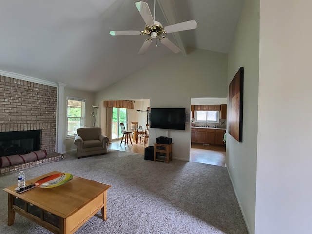 3393 Kevin Cir, Warren, MI 48092 - living room featuring carpet flooring, beam ceiling, ceiling fan, plenty of natural light, and a fireplace