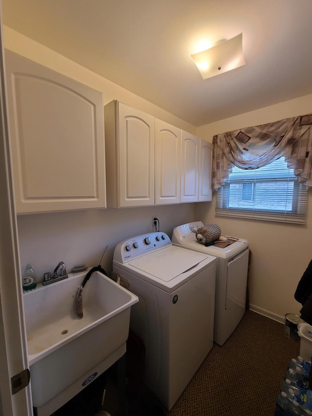 3393 Kevin Cir, Warren, MI 48092 - laundry area with washer and clothes dryer and cabinet space