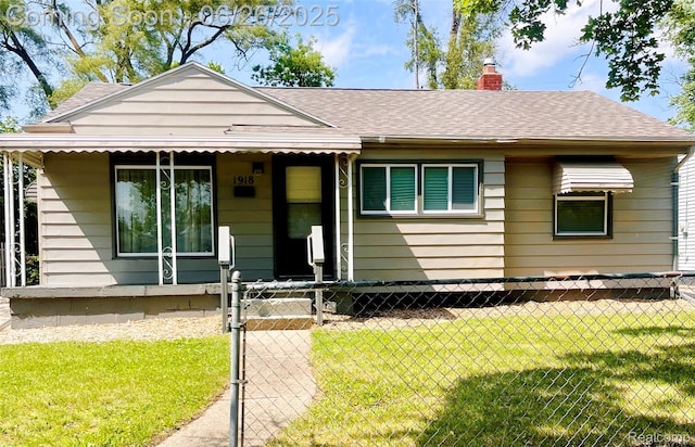 1918 Cherrylawn Dr, Flint, MI 48504 - bungalow-style home featuring a fenced front yard, a chimney, a gate, and roof with shingles