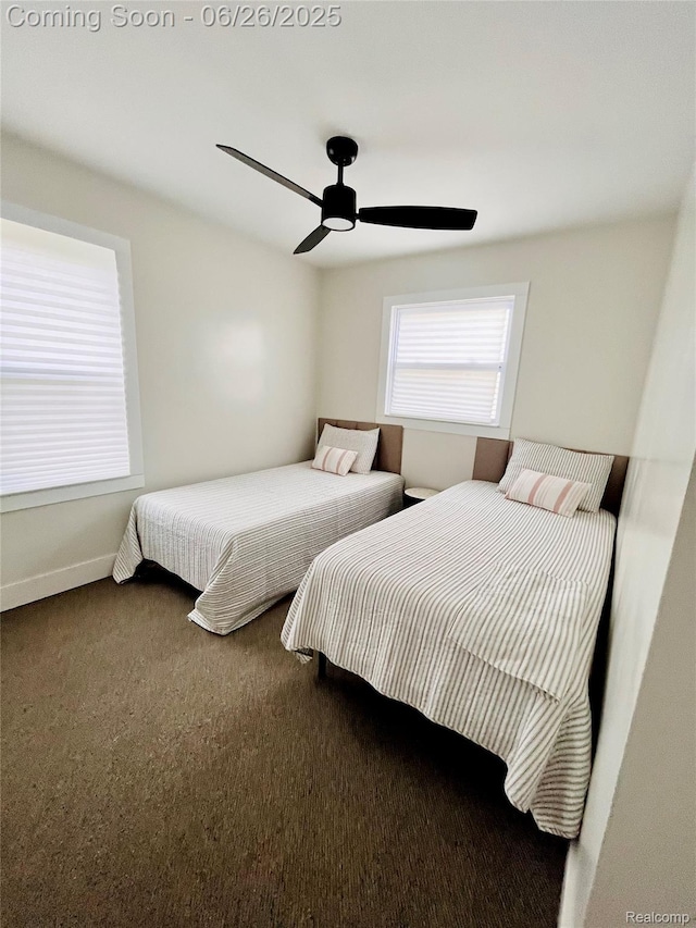 1918 Cherrylawn Dr, Flint, MI 48504 - bedroom with dark carpet and a ceiling fan