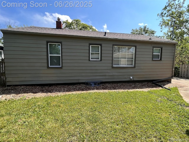 1918 Cherrylawn Dr, Flint, MI 48504 - view of side of home with a chimney