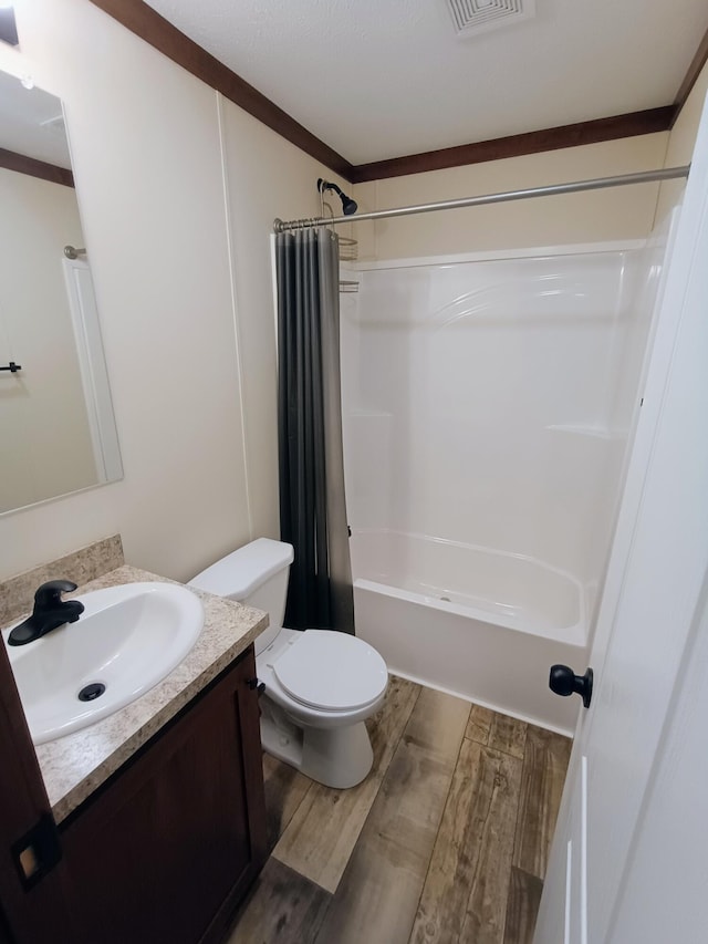 770 129th Ave Unit 4, Shelbyville, MI 49344 - full bathroom with vanity, shower / bathtub combination with curtain, and wood finished floors