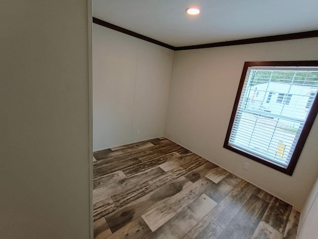 770 129th Ave Unit 4, Shelbyville, MI 49344 - unfurnished room with wood finished floors, ornamental molding, and recessed lighting