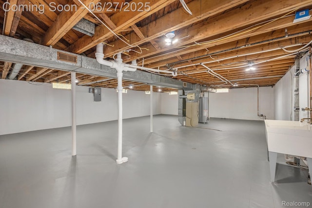 22252 Dale Allen St, Mount Clemens, MI 48035 - basement with water heater and electric panel