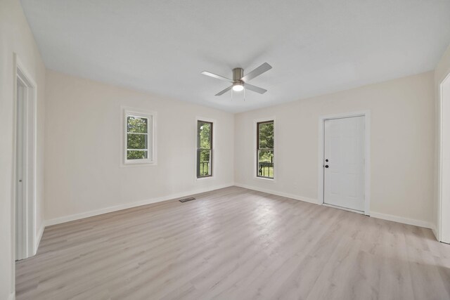 15379 Howard Rd, Hanover, MI 49241 - spare room with a ceiling fan and light wood-style flooring