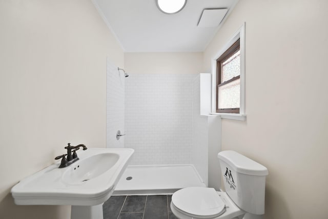 15379 Howard Rd, Hanover, MI 49241 - bathroom featuring a tile shower, tile patterned flooring, and crown molding