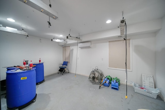 15379 Howard Rd, Hanover, MI 49241 - finished below grade area featuring a wall mounted air conditioner and recessed lighting
