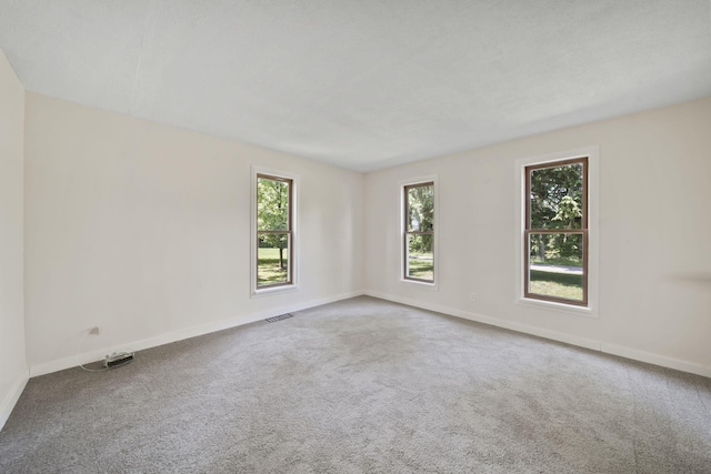15379 Howard Rd, Hanover, MI 49241 - carpeted empty room with baseboards