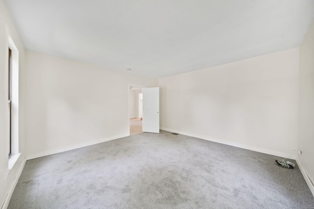 15379 Howard Rd, Hanover, MI 49241 - carpeted spare room with baseboards