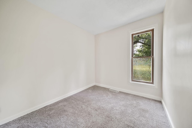 15379 Howard Rd, Hanover, MI 49241 - spare room with carpet