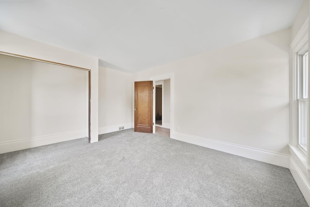 15379 Howard Rd, Hanover, MI 49241 - unfurnished bedroom with carpet floors and a closet