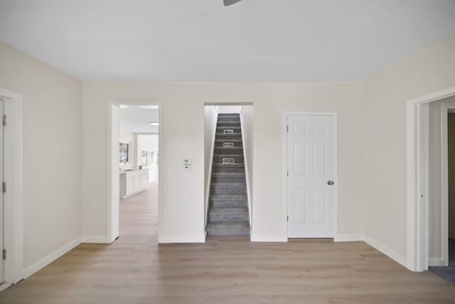 15379 Howard Rd, Hanover, MI 49241 - unfurnished bedroom with light wood-style flooring and a closet