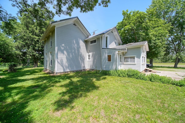 15379 Howard Rd, Hanover, MI 49241 - view of property exterior featuring a yard