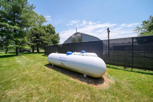15379 Howard Rd, Hanover, MI 49241 - exterior view of propane tank