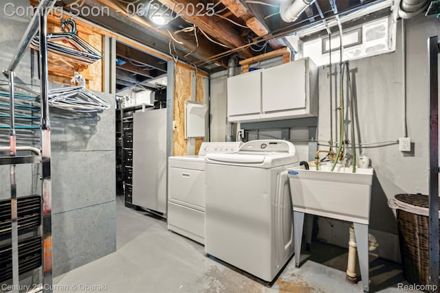 33911 Pawnee St, Westland, MI 48185 - washroom featuring cabinet space and washer and clothes dryer