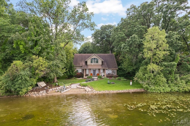 14967 S Shore Dr, Addison, MI 49220 - back of house with a water view and a yard