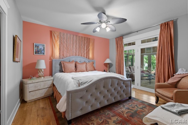 14967 S Shore Dr, Addison, MI 49220 - bedroom with access to outside, wood finished floors, a ceiling fan, and french doors