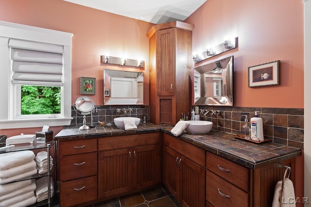 14967 S Shore Dr, Addison, MI 49220 - bathroom featuring backsplash, double vanity, and tile patterned floors