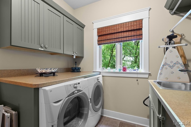 14967 S Shore Dr, Addison, MI 49220 - laundry room featuring cabinet space, washer and dryer, tile patterned floors, and radiator heating unit